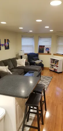 a living room with furniture and a table