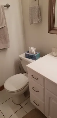 a bathroom with a toilet and a sink