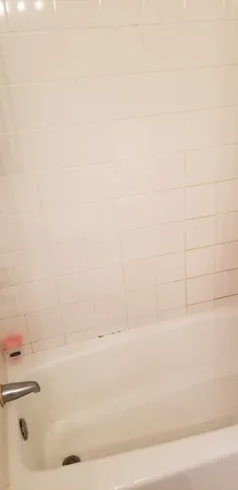 a bathroom with a bathtub