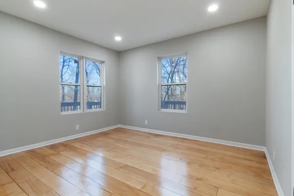 an empty room with windows
