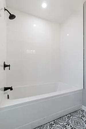 a bathroom with a bathtub