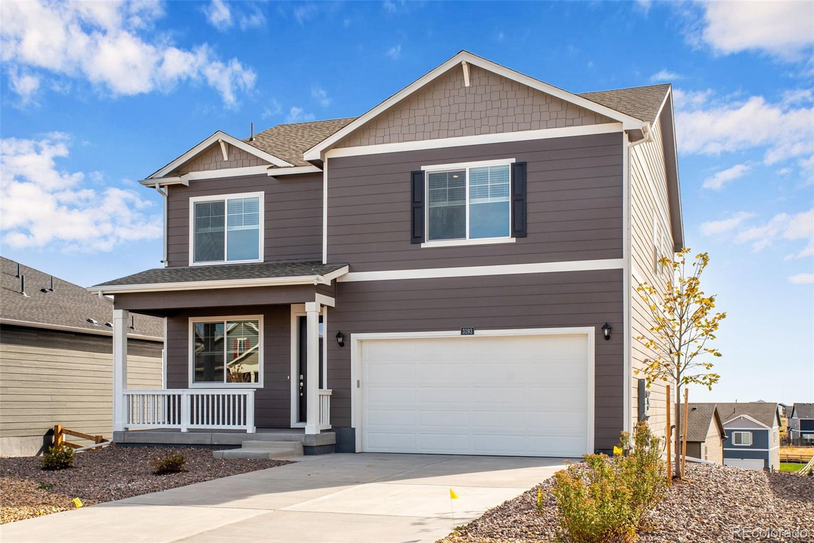 2238 Base Street Fort Lupton, CO 80621 - Photo 2 of 30 a front view of a house with a yard