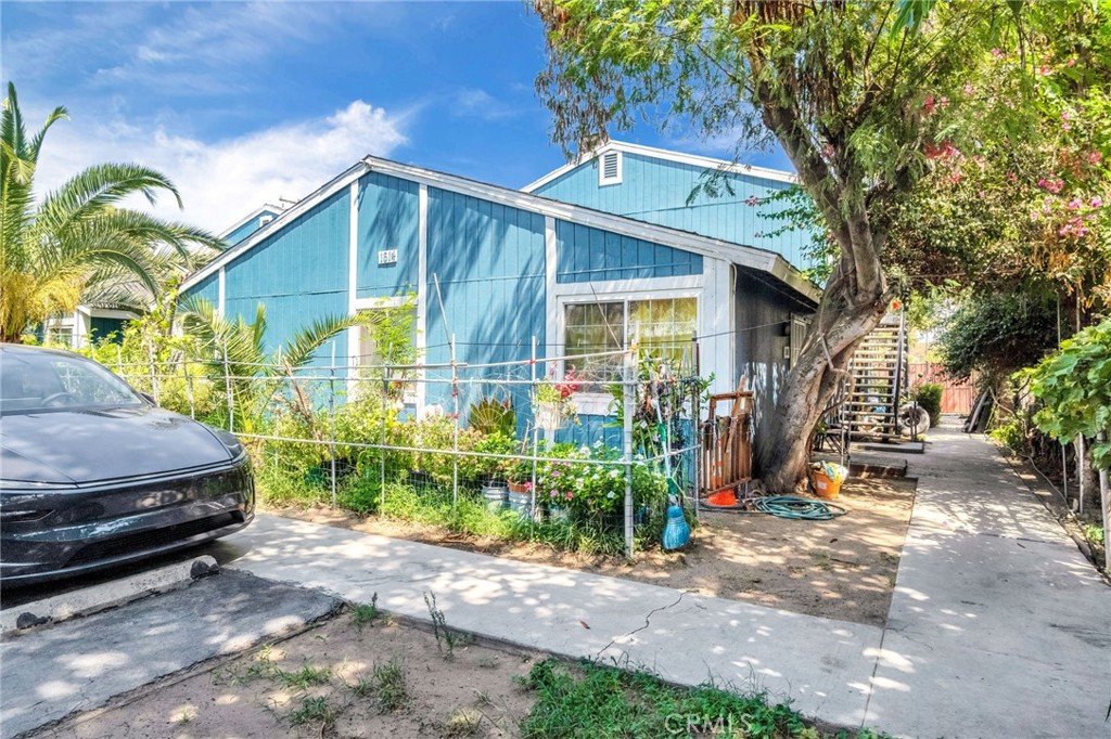 1624 B Street Fresno, CA 93706 - Photo 15 of 32 a view of a car park in front of a house