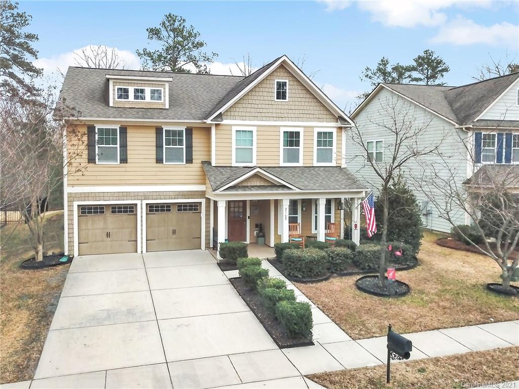 2162 Bluebell Way Tega Cay, SC 29708 - Photo 2 of 37 a front view of a house with garden
