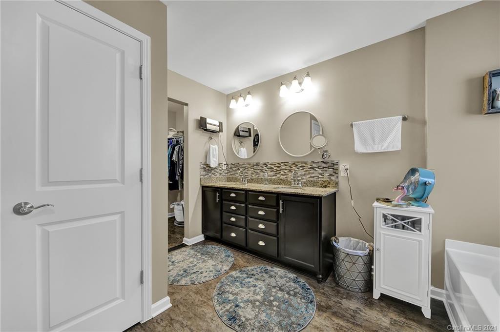 2162 Bluebell Way Tega Cay, SC 29708 - Photo 26 of 37 a view of cabinets with a wooden floor