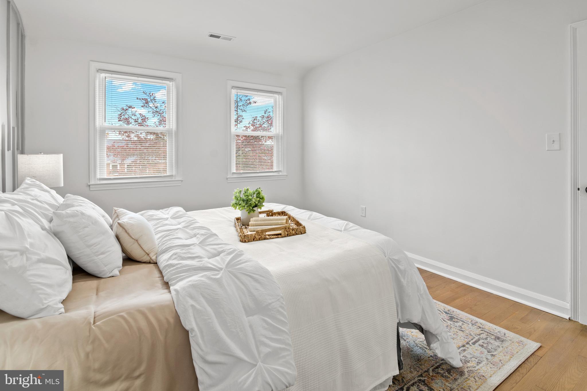 1212 Cedarcroft Road Baltimore, MD 21239 - Photo 25 of 42 a bedroom with a bed and a window