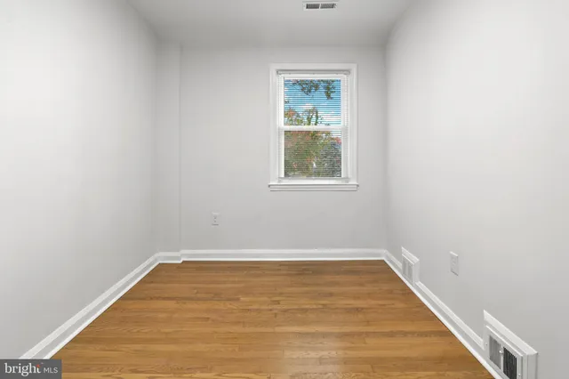 an empty room with window