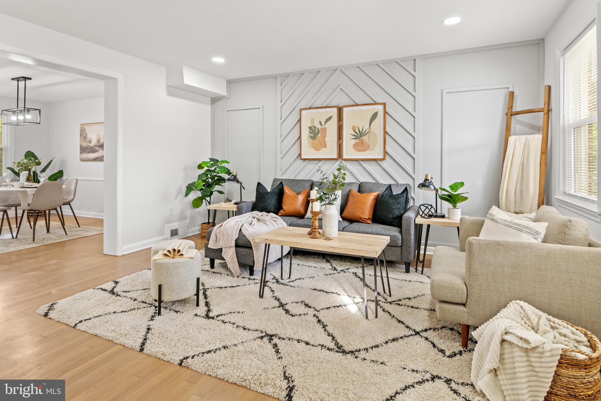 1212 Cedarcroft Road Baltimore, MD 21239 - Photo 5 of 42 a living room with furniture and a large window