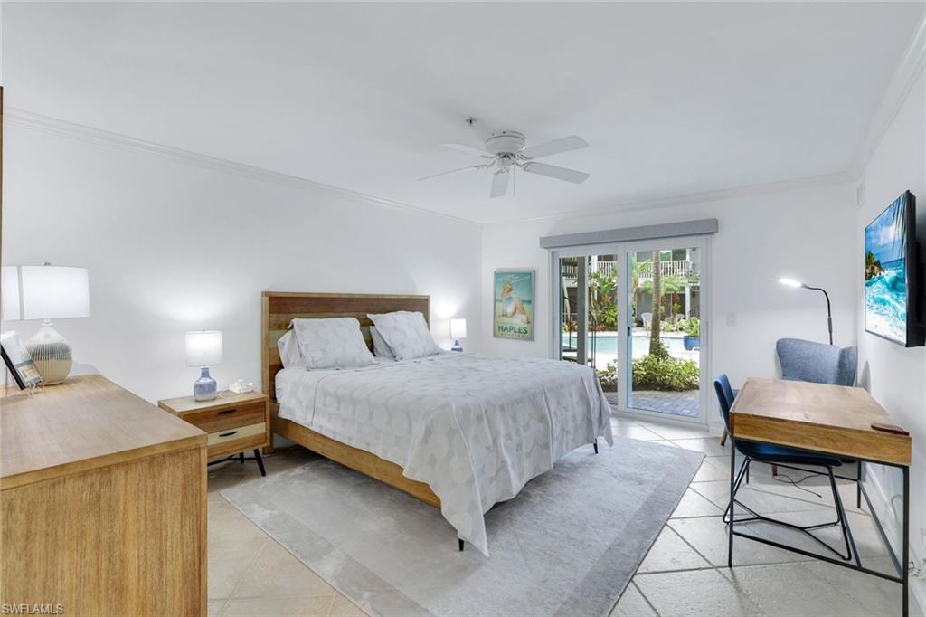 376 3rd Street South, Unit 102 Naples, FL 34102 - Photo 10 of 17 Bedroom featuring crown molding, access to exterior, and ceiling fan