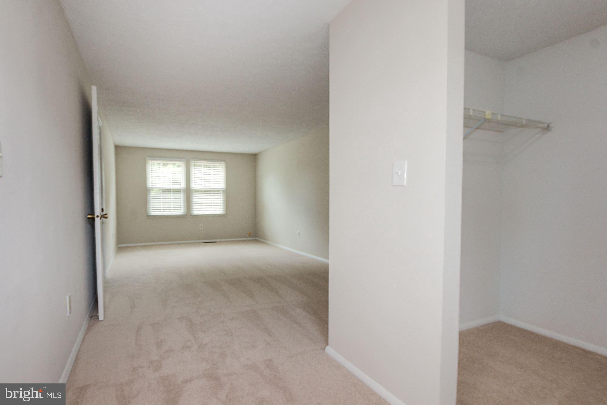 14400 Twig Road Silver Spring, MD 20905 - Photo 13 of 25 Master Bedroom with Walk-In Closet