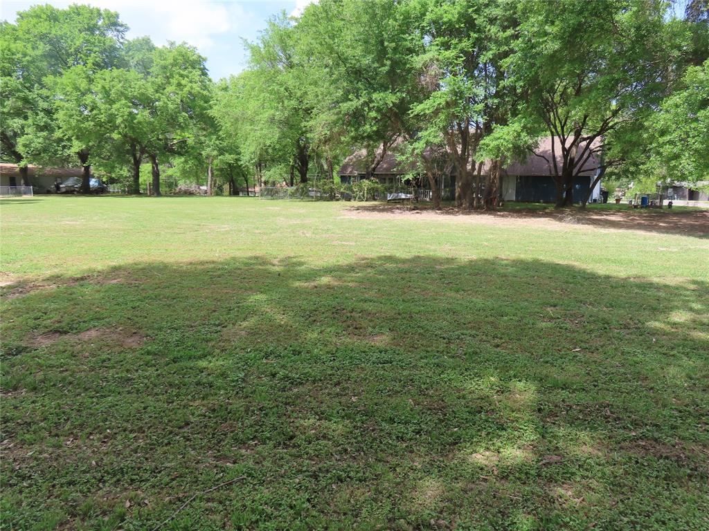 0 Henry Iv Mabank, TX 75156 - Photo 2 of 10 a view of outdoor space with deck and trees