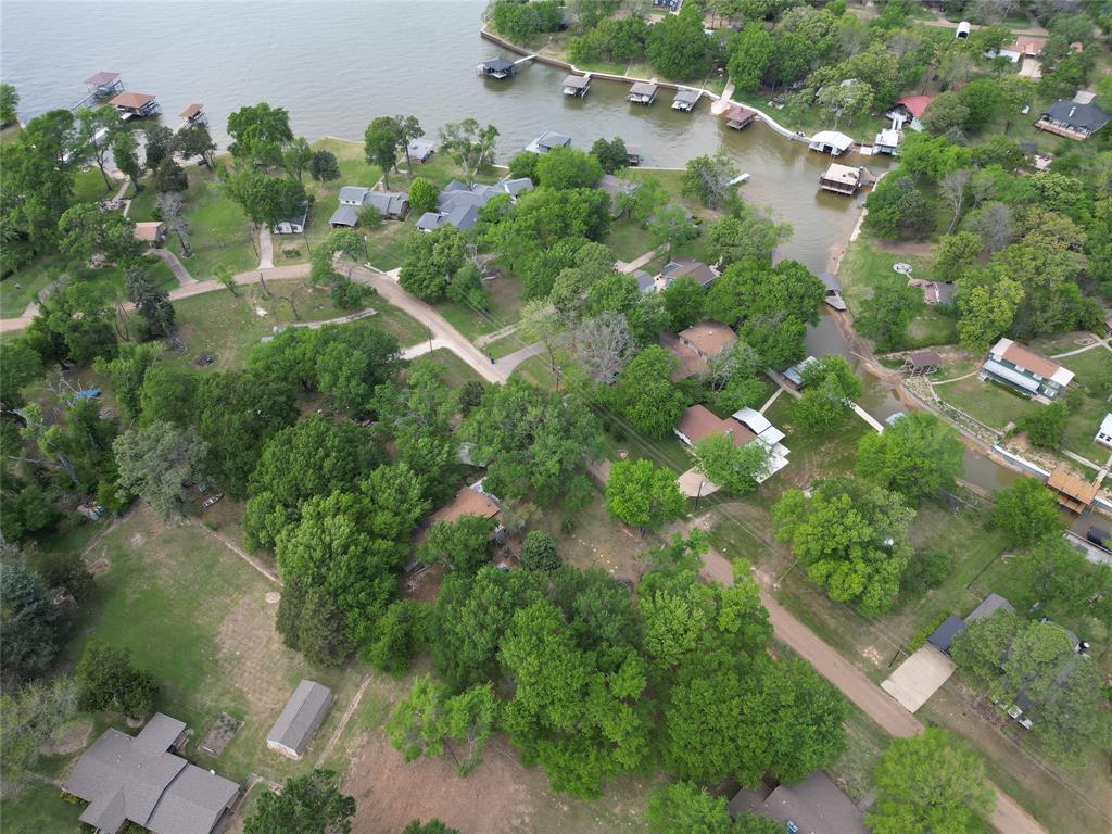 0 Henry Iv Mabank, TX 75156 - Photo 9 of 10 an aerial view of residential houses with outdoor space and trees all around