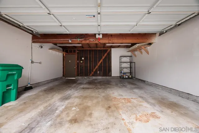 a view of a room with wooden walls