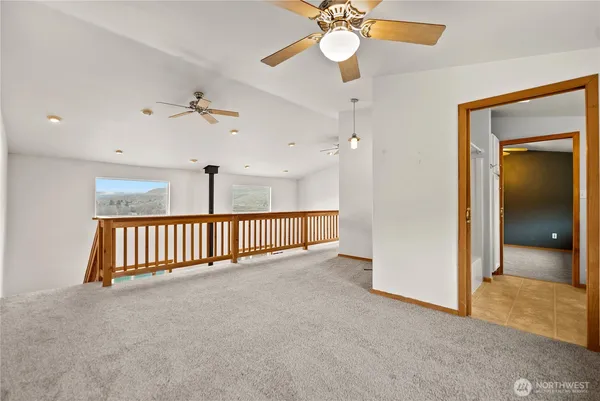 en view interior of a house with a chandelier fan