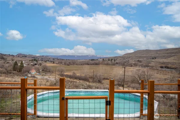 a view of a lake from a balcony