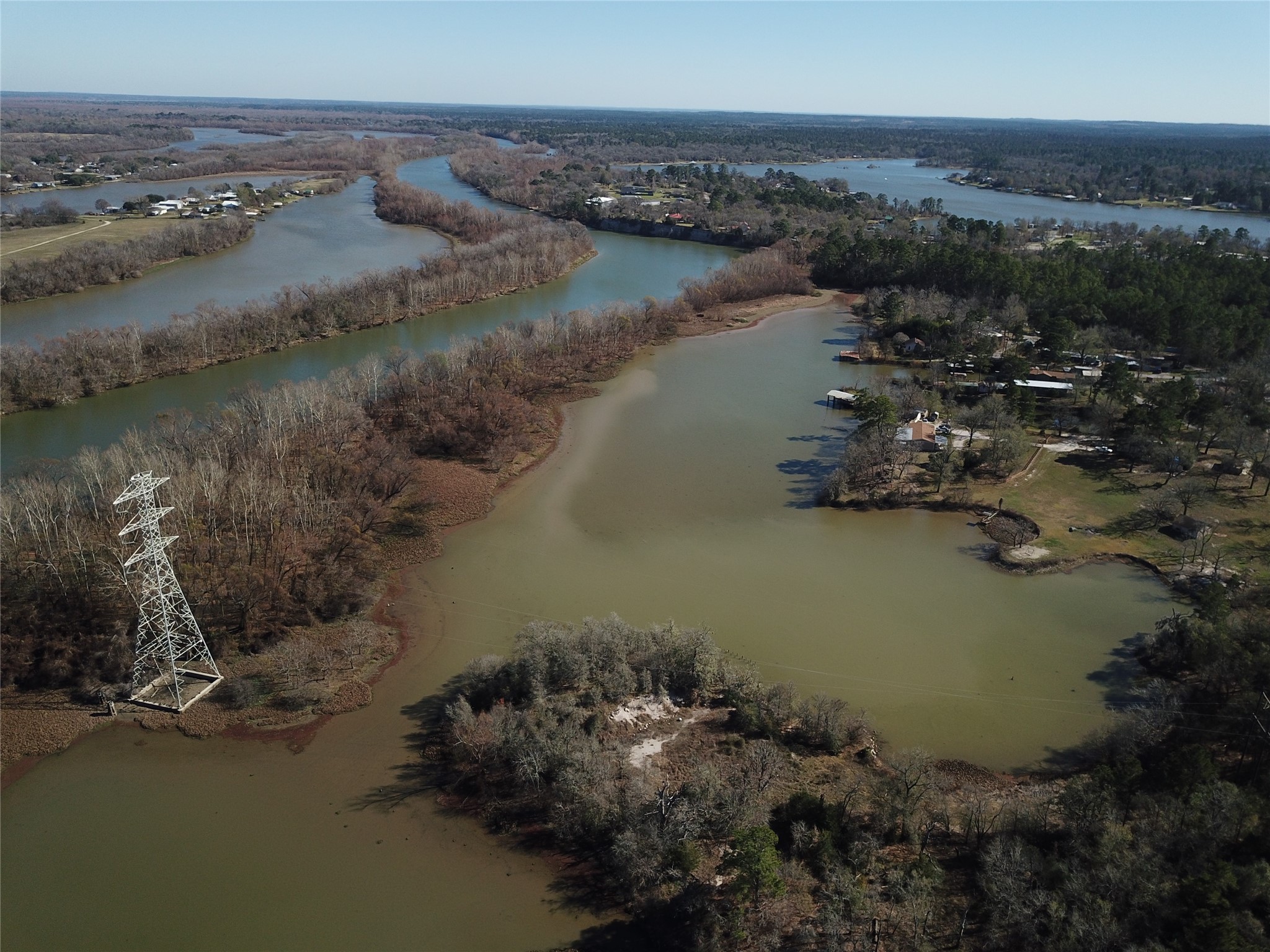an aerial view of a houses with ocean view