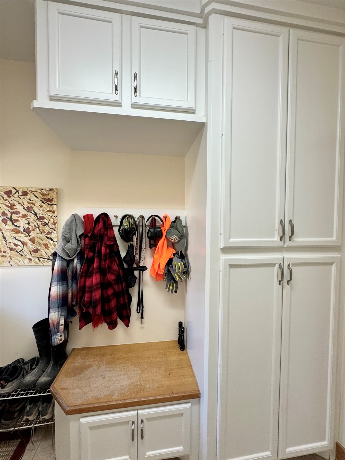 55 Lake Road Huntsville, TX 77320 - Photo 27 of 50 a view of walk in closet with clothes and shoes