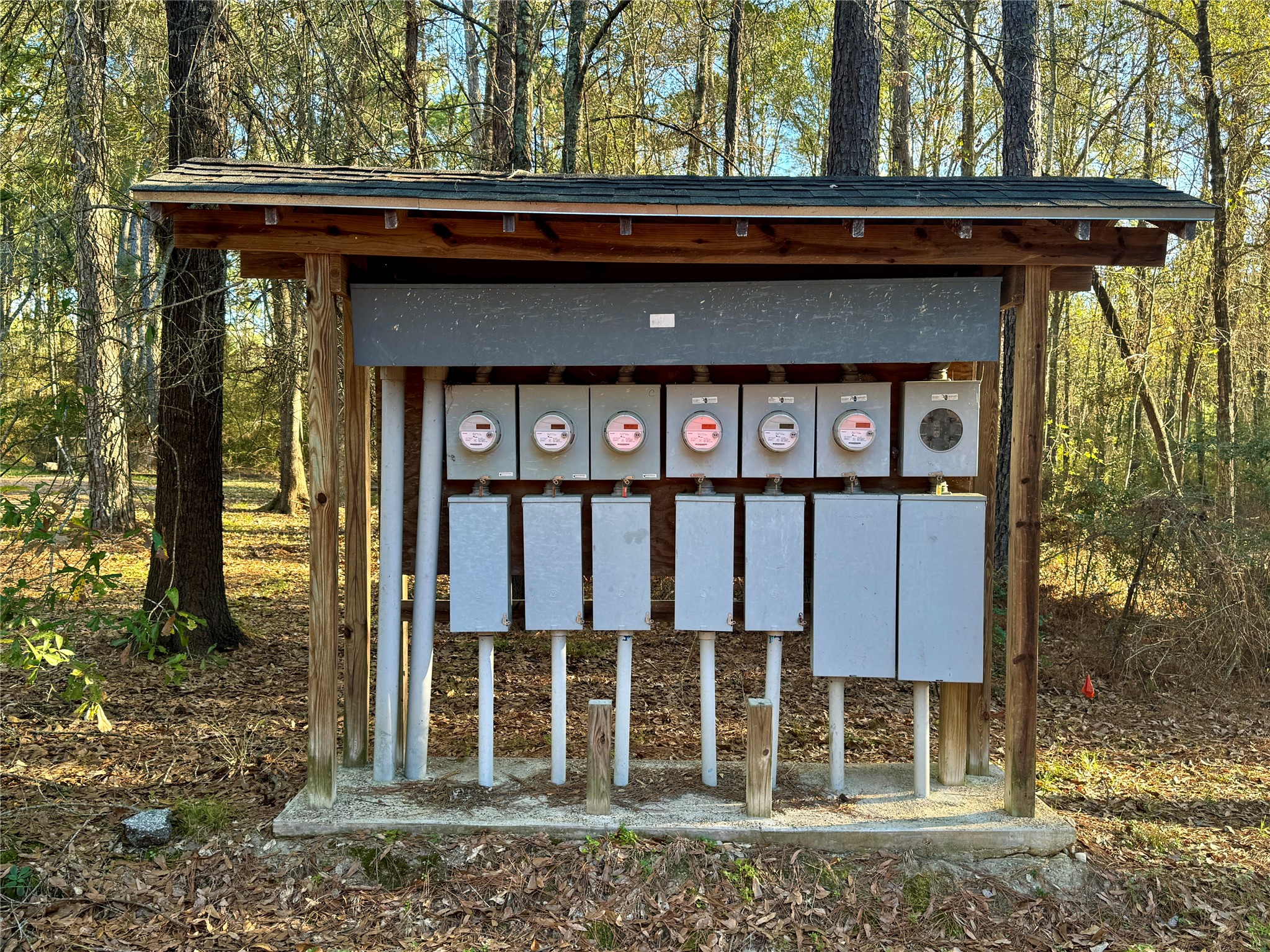 55 Lake Road Huntsville, TX 77320 - Photo 47 of 50 a front view of a house with a yard