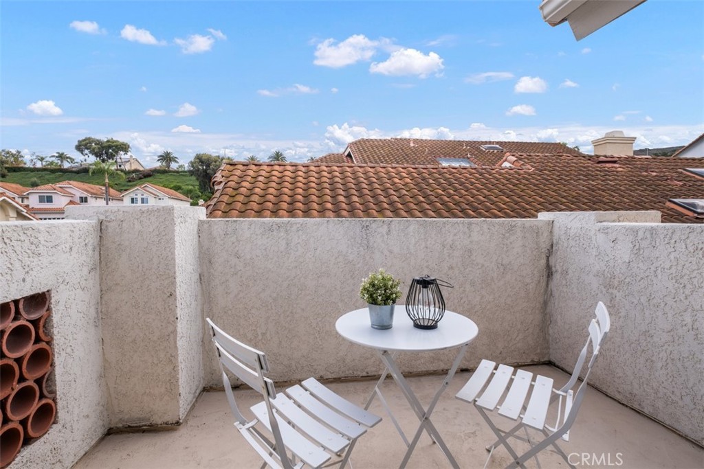 10 Finca San Clemente, CA 92672 - Photo 17 of 27 a view of a patio with table and chairs