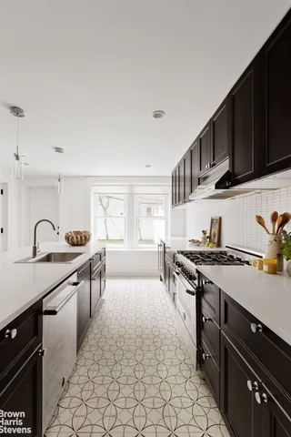 a living room with furniture a flat screen tv and a table