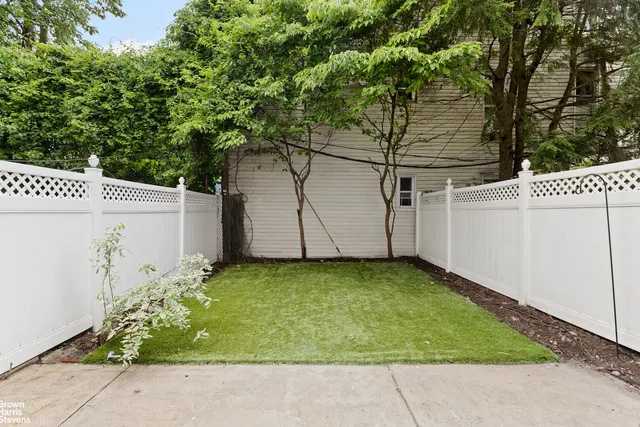 a kitchen with stainless steel appliances a sink stove and cabinets