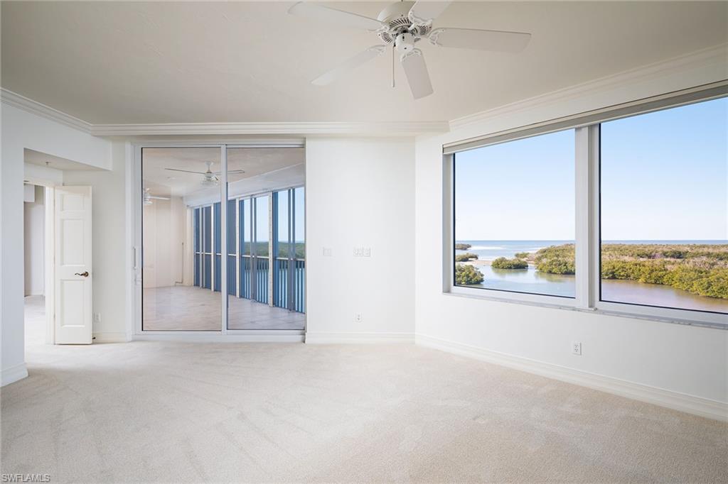 435 Dockside Drive, Unit B703 Naples, FL 34110 - Photo 18 of 38 a view of an empty room with a window