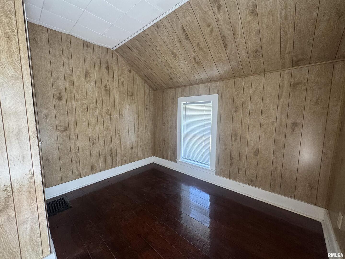 302 Coeburg Street Rio, IL 61472 - Photo 21 of 24 a view of an empty room with wooden floor