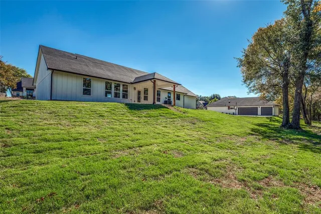 a house view with a garden space