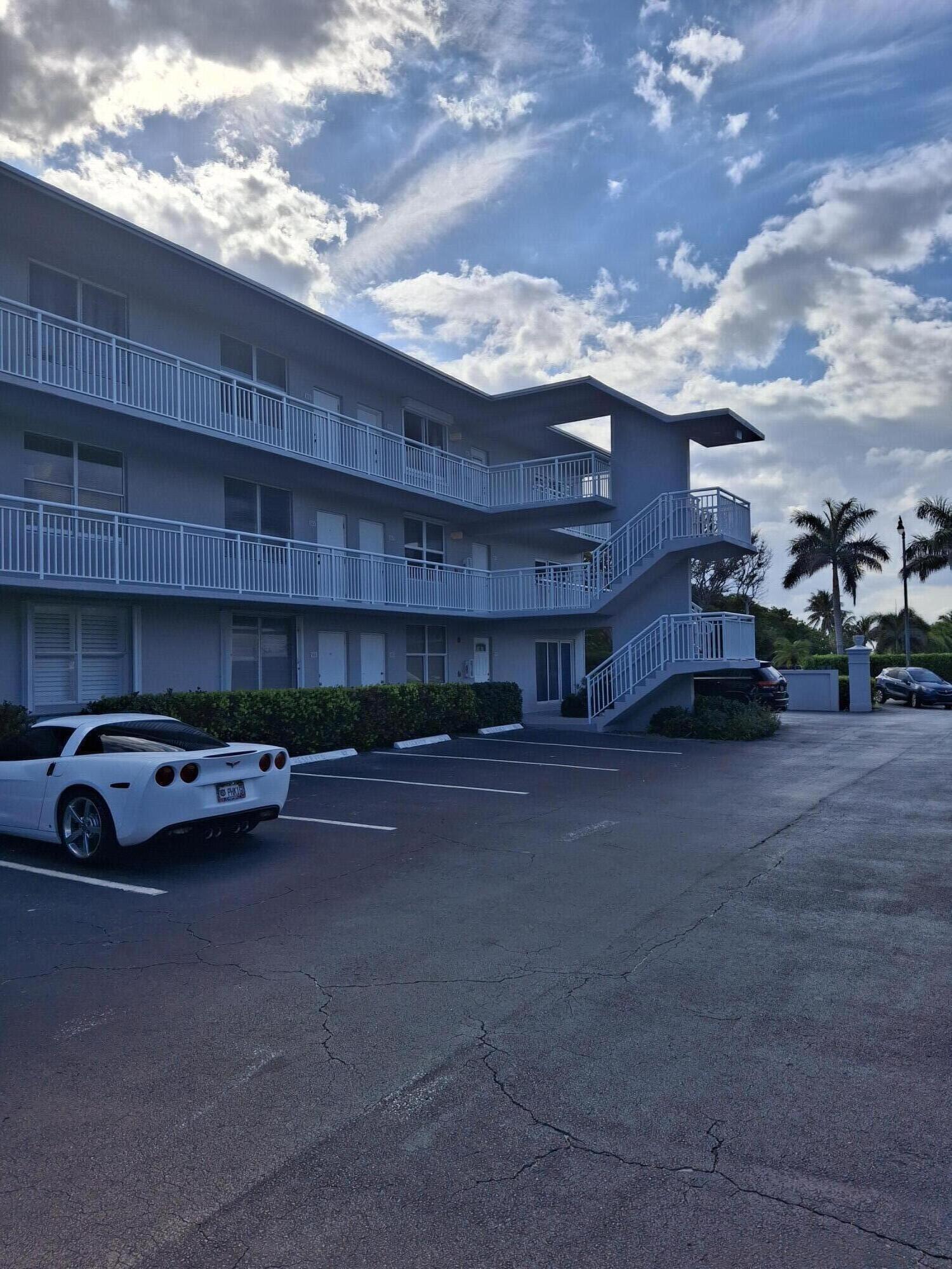 2565 South Ocean Boulevard, Unit 2060 Palm Beach, FL 33480 - Photo 17 of 17 a car parked in front of a building