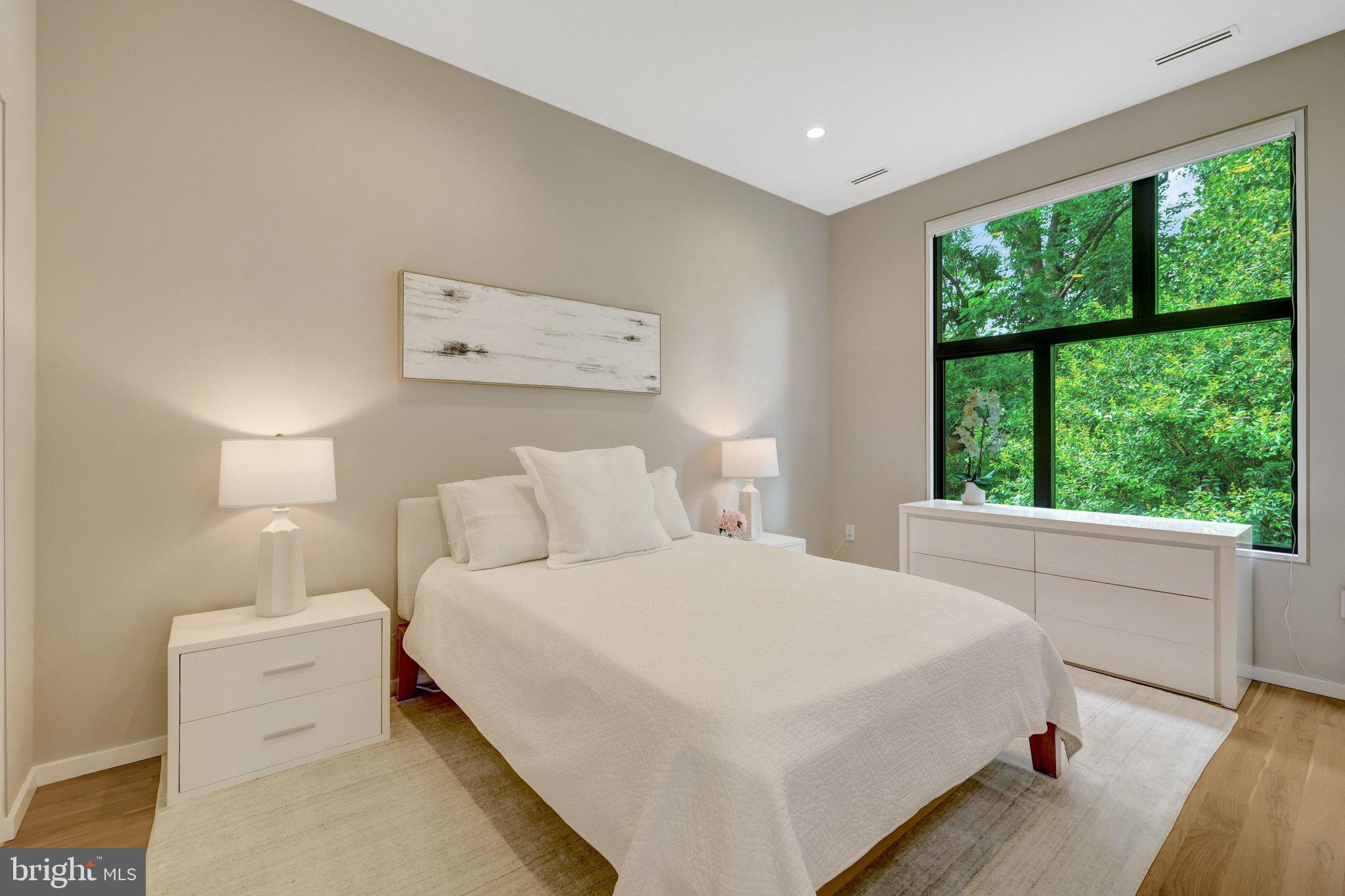 7815 Old Falls Road McLean, VA 22102 - Photo 45 of 85 Generous upper bedroom 2 with serene tree views