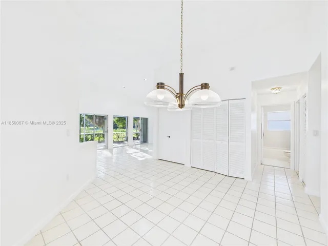 a view of a room with windows