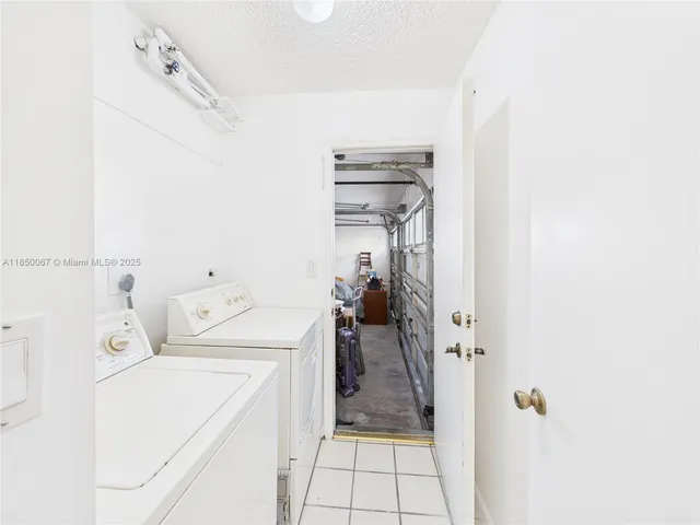 a picture of a bathroom with a bathtub