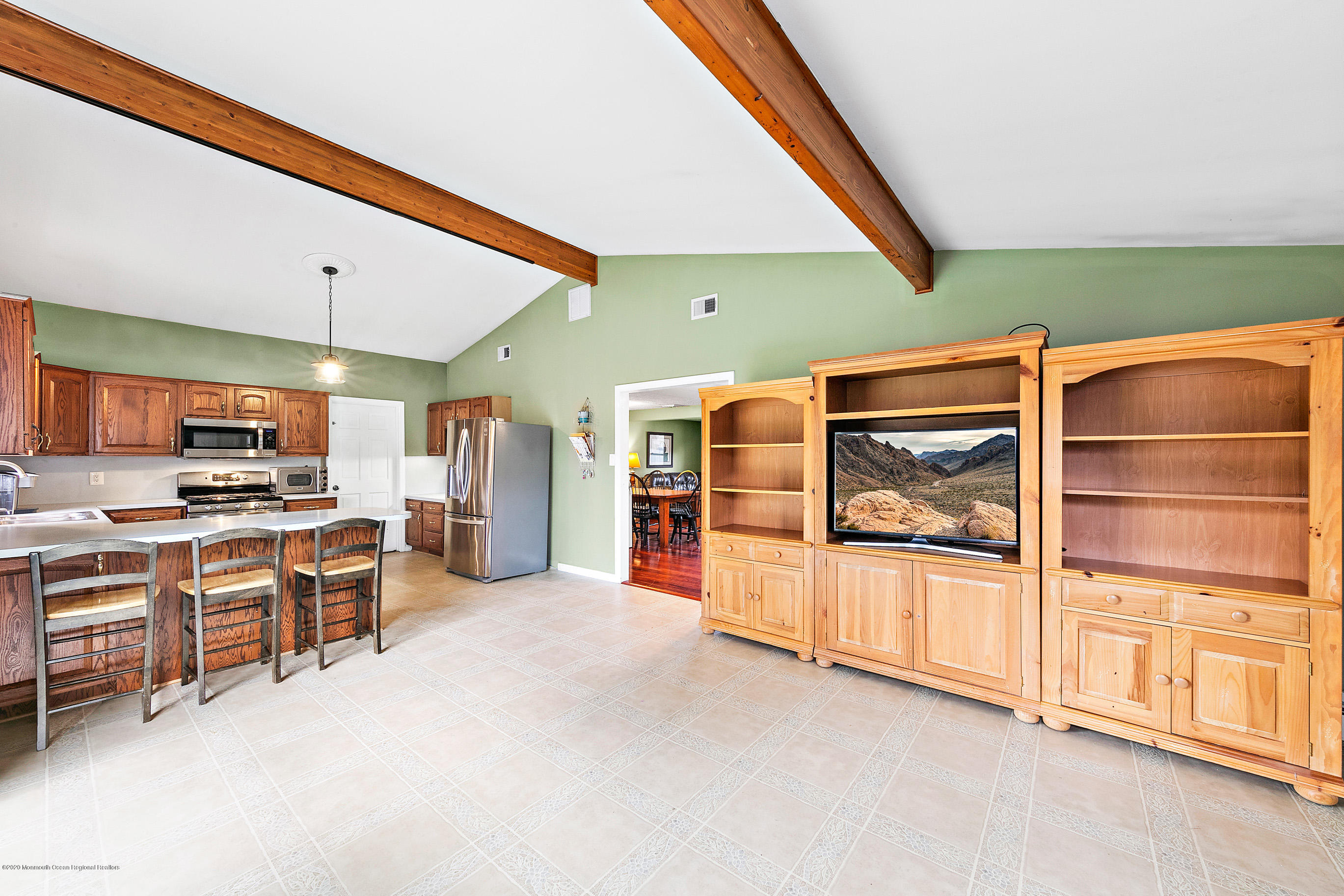 121 Wave Road Manahawkin, NJ 08050 - Photo 24 of 40 a view of a kitchen with furniture and stove