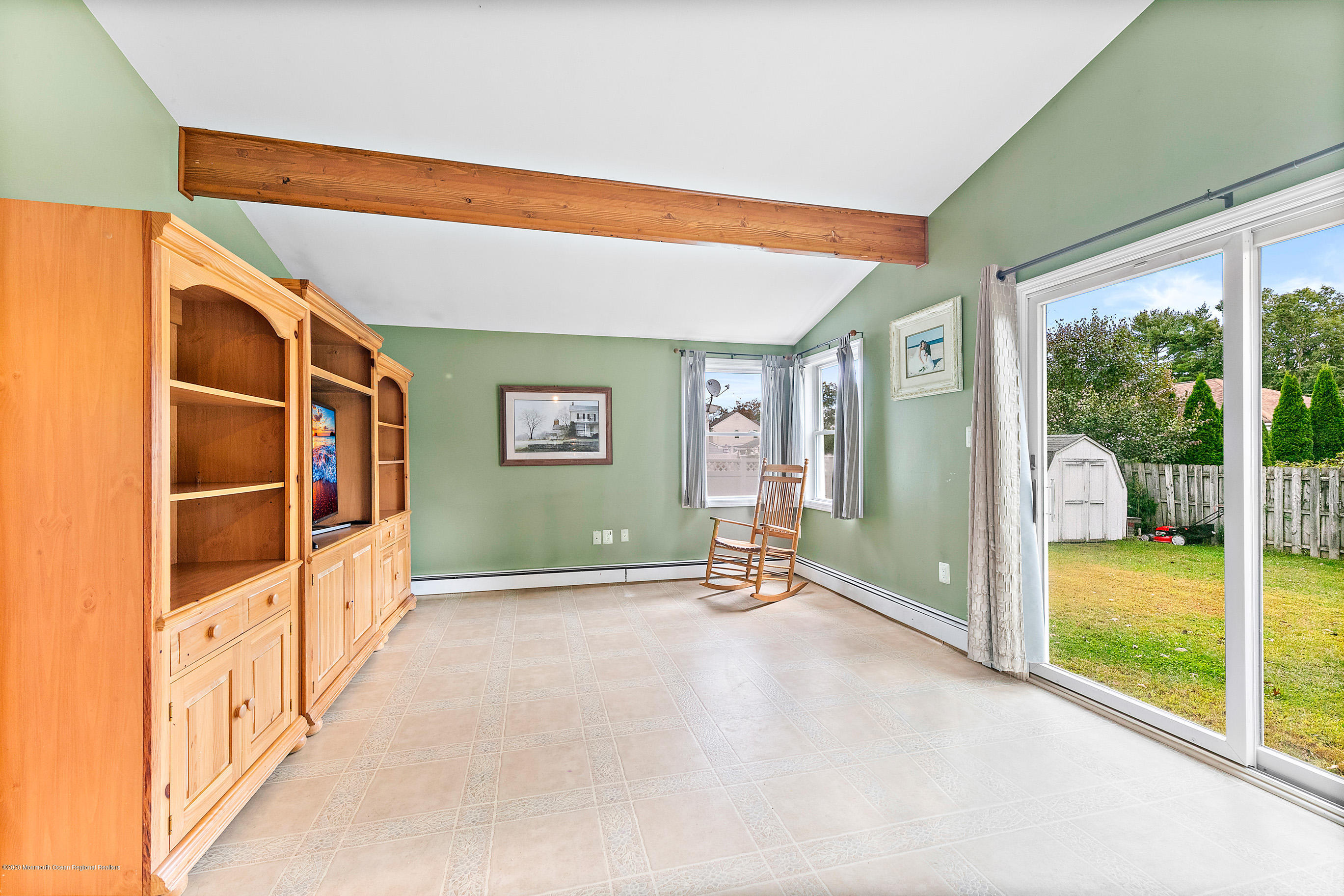 121 Wave Road Manahawkin, NJ 08050 - Photo 25 of 40 a view of an entryway with wooden floor and door