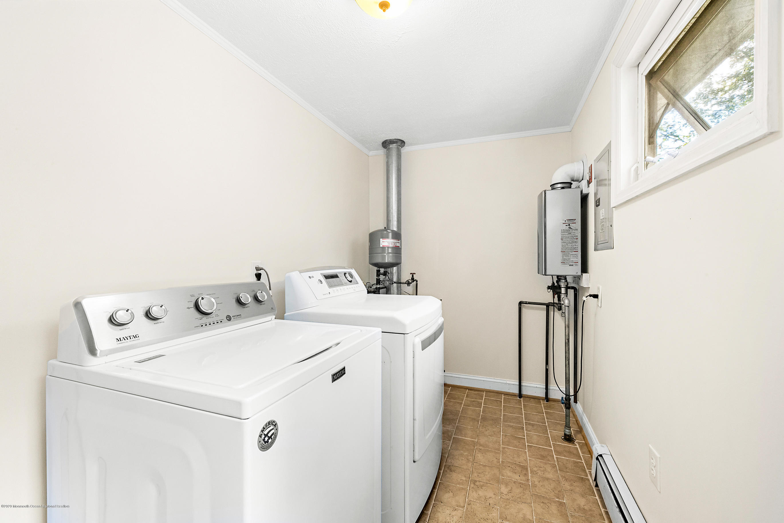 121 Wave Road Manahawkin, NJ 08050 - Photo 36 of 40 a utility room with dryer and washer