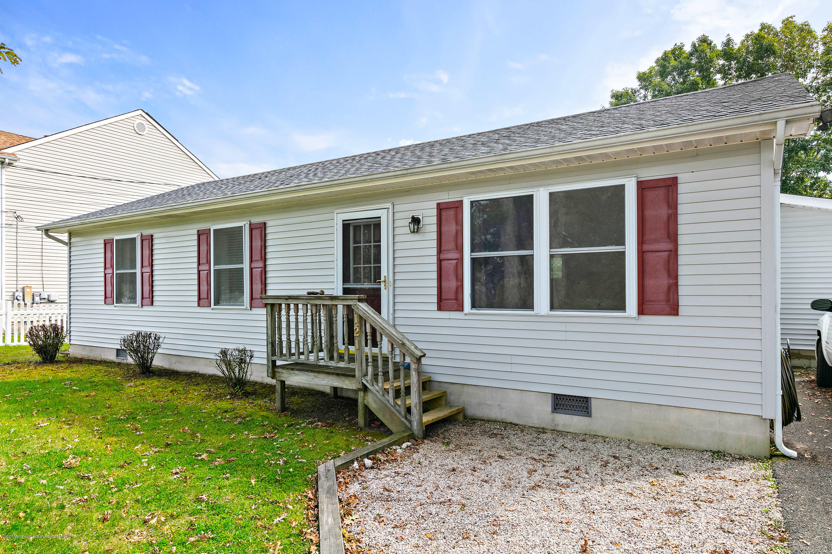 121 Wave Road Manahawkin, NJ 08050 - Photo 7 of 40 a view of a house with a backyard