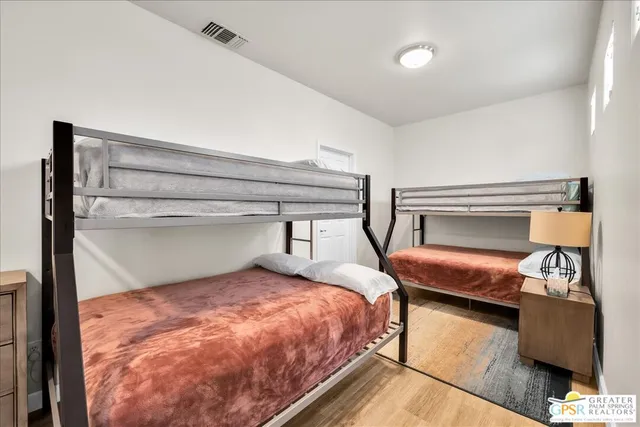 a view of a room with racks on the wall