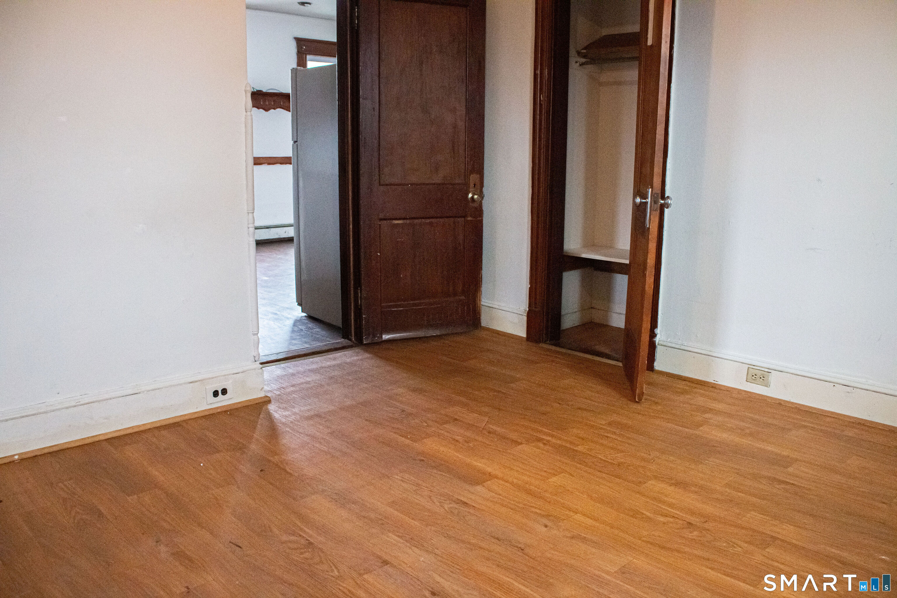 405 Wilson Street, Unit 3 Waterbury, CT 06708 - Photo 6 of 7 an empty room with closet