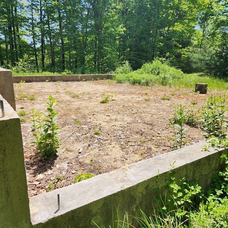 181 A South Road Pepperell, MA 01463 - Photo 11 of 13 a view of a yard with wooden fence