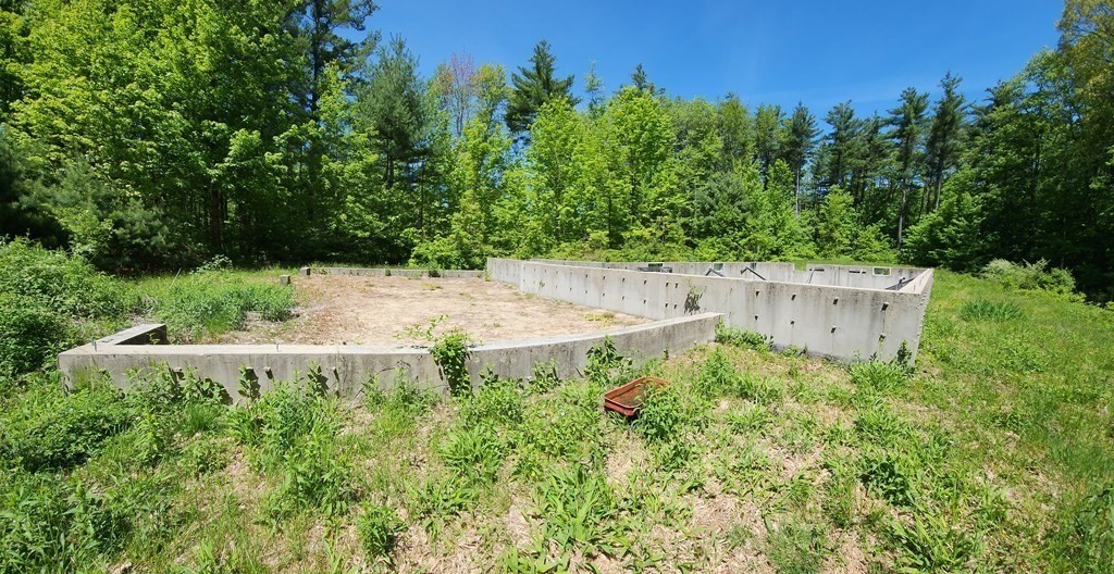 181 A South Road Pepperell, MA 01463 - Photo 6 of 13 an aerial view of a house with a yard