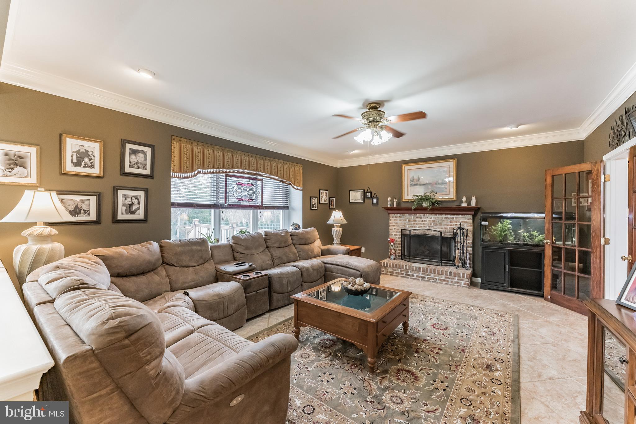 2037 Carmel Drive Jamison, PA 18929 - Photo 12 of 42 Large family rm w brick wood burning Fireplace