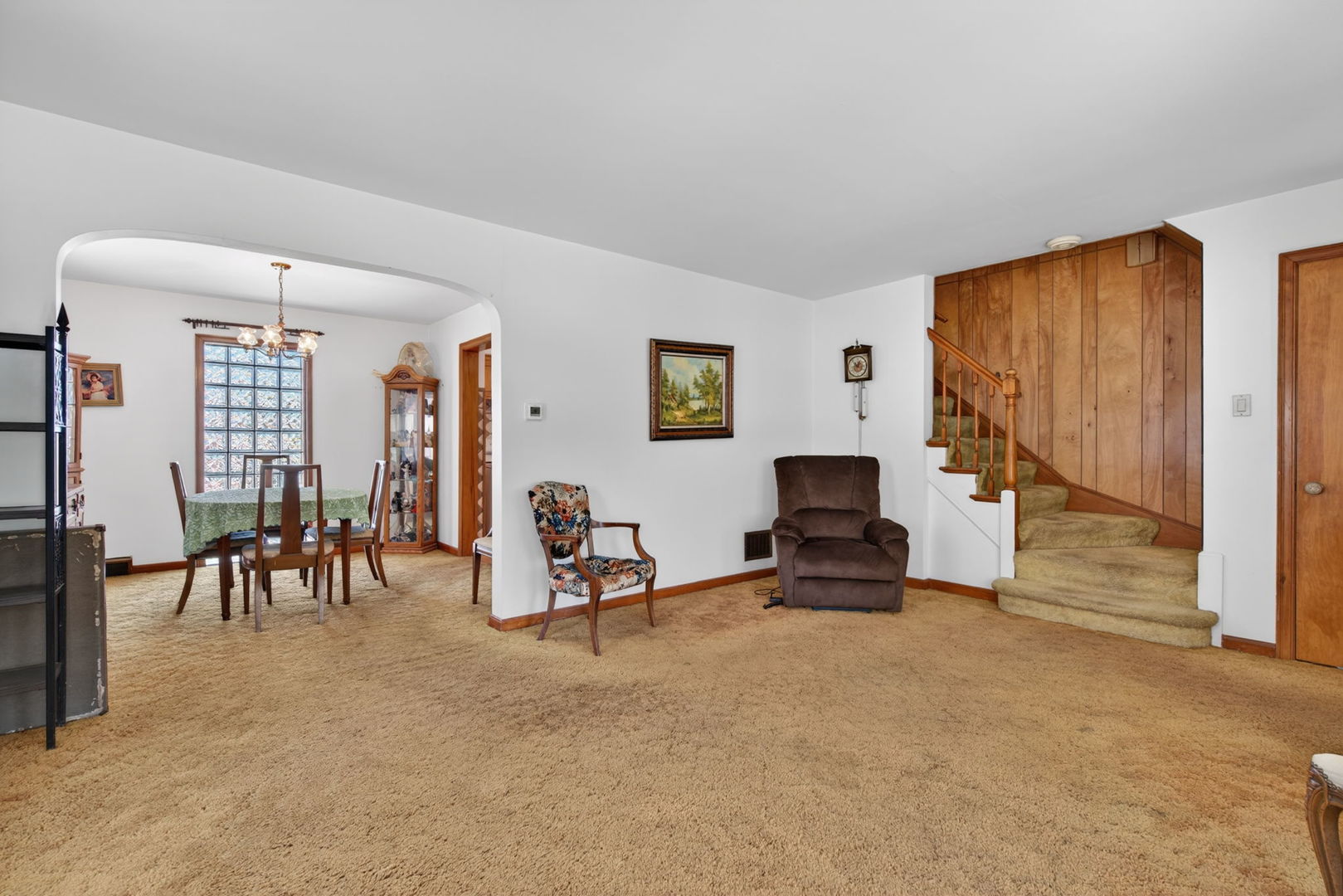 9020 West Forestview Drive North Riverside, IL 60546 - Photo 5 of 19 a living room with furniture and a fireplace
