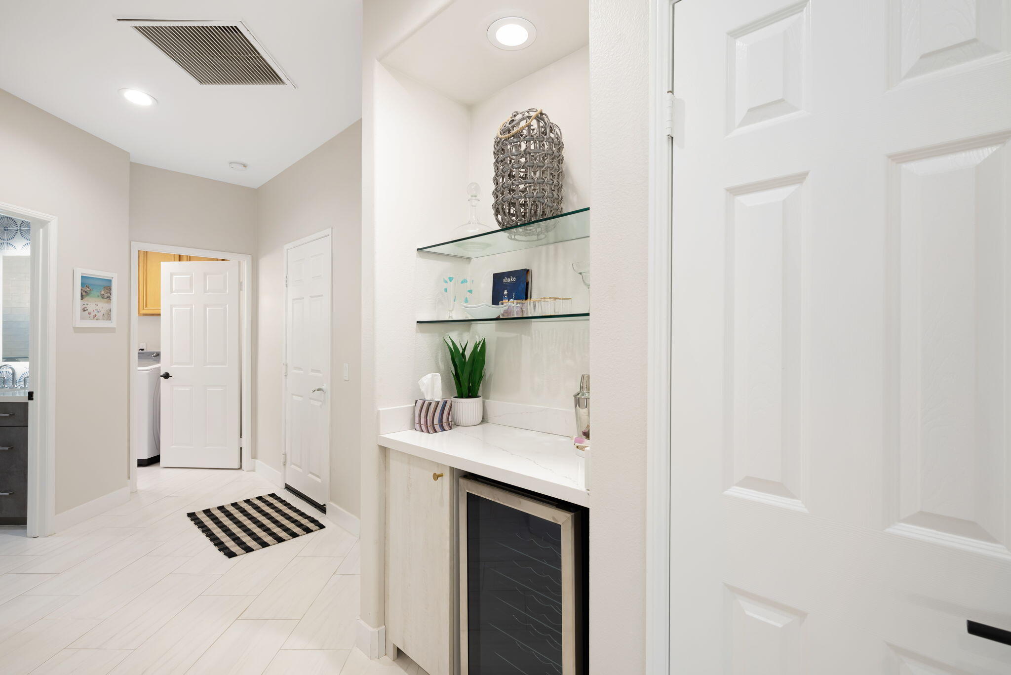 45809 Crosswater Street Indio, CA 92201 - Photo 44 of 48 a view of kitchen with hallway and wooden floor