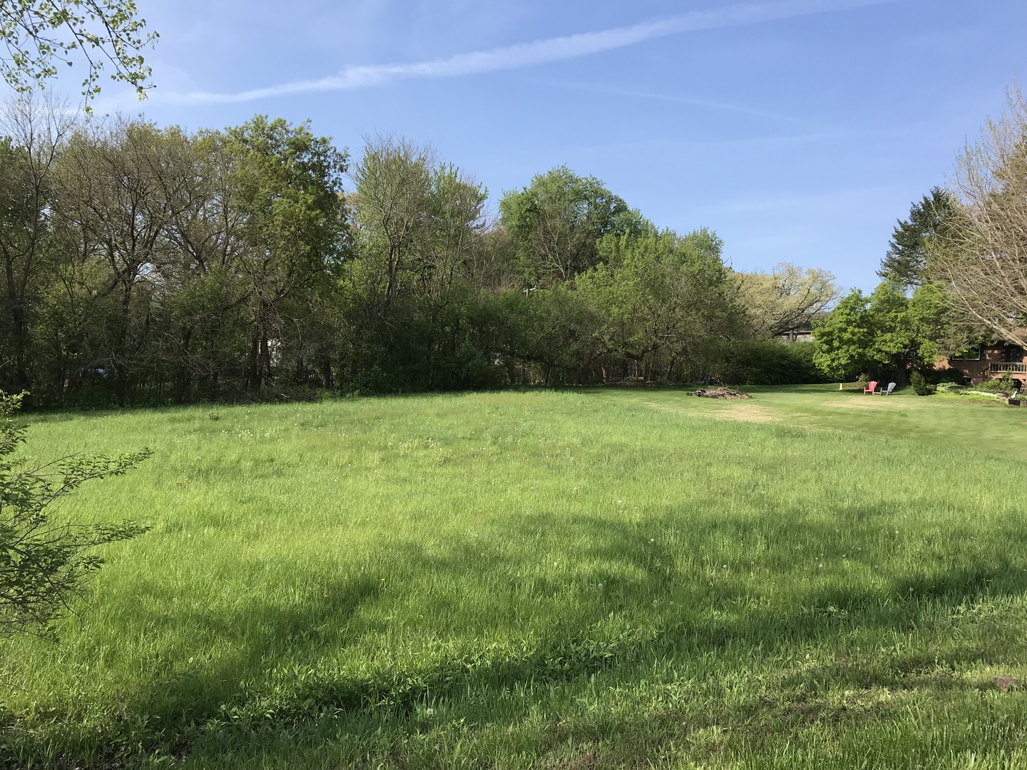 28577 West Fox River Road Cary, IL 60013 - Photo 6 of 12 a view of a grassy field with trees in the background