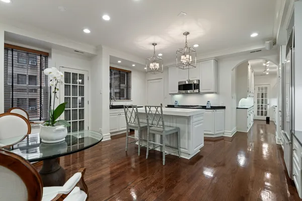 a view of livingroom and kitchen with wooden floor