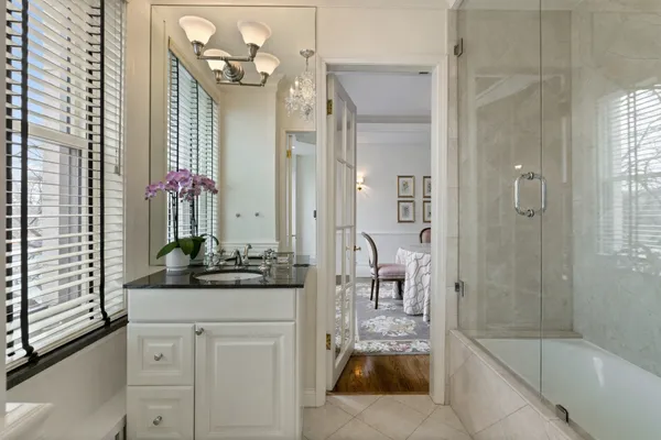 a room with gym equipment and large mirror