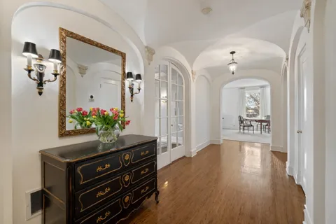 a spacious bedroom with a bed and window