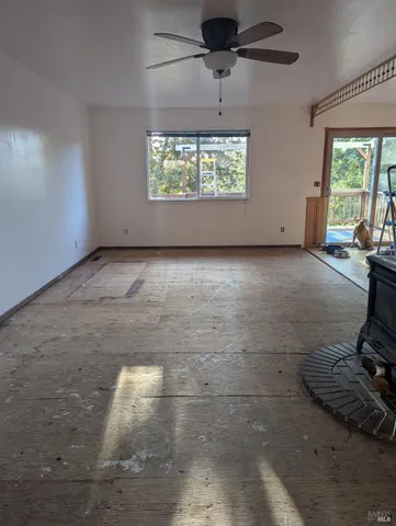 a stove top oven sitting inside of a kitchen