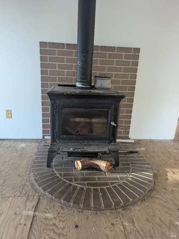 a kitchen with a sink a counter top space cabinets and stainless steel appliances