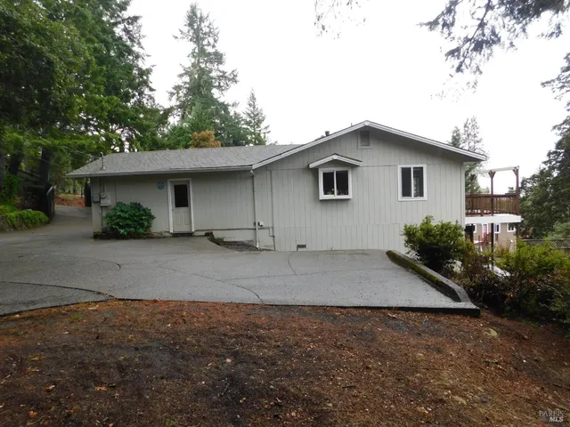 a house view with a outdoor space